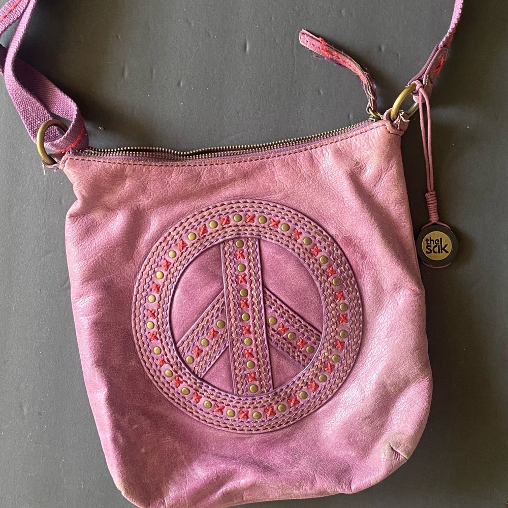 The Sak Pink Leather Crossbody with Studded Peace Sign